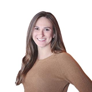 Image of a woman standing against a white background
