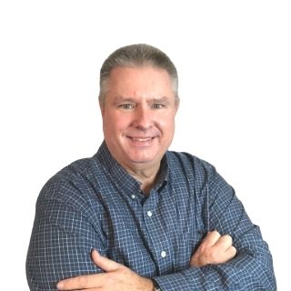 Image of a man standing against a white background