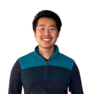 Image of a man standing against a white background