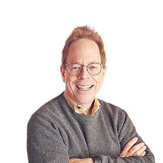 Image of a man standing against a white background