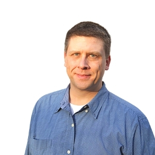 Image of a man standing against a white background