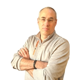 Image of a man standing against a white background