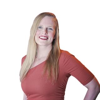 Woman standing in front of a white background