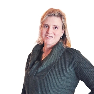 Woman standing in front of a white background