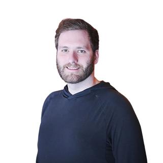 Image of a man standing against a white background