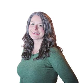 Woman standing against a white background